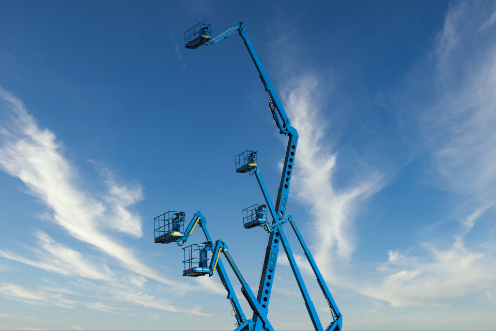five cherry pickers in the sky